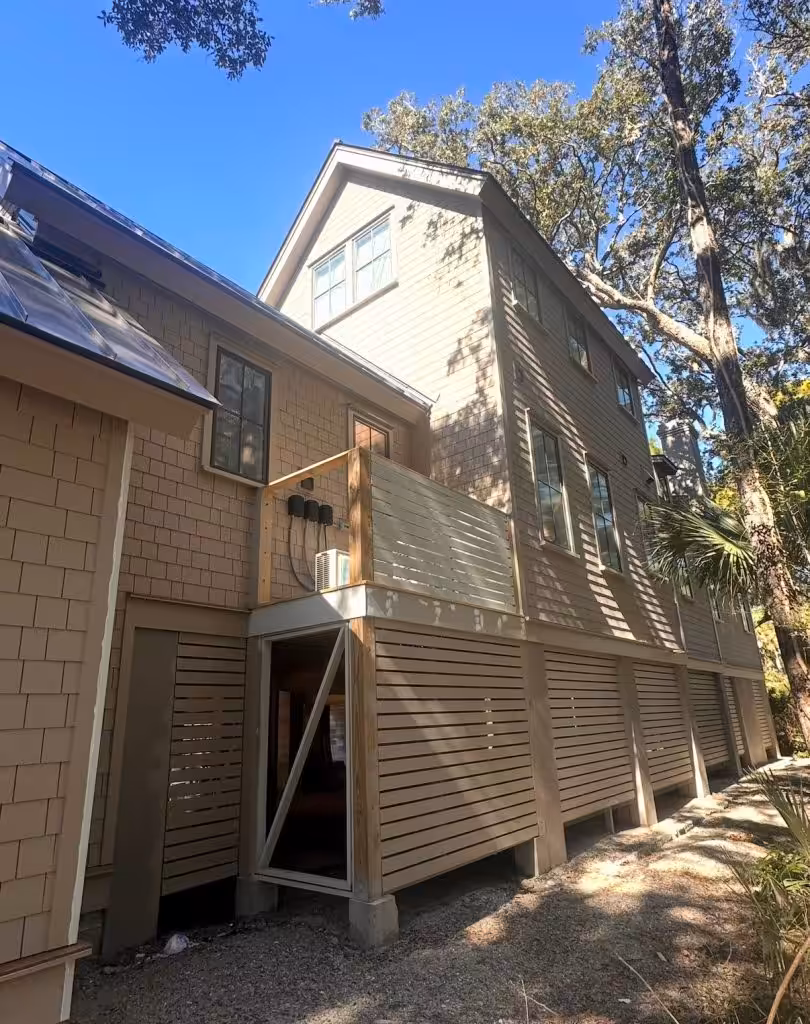 Tan house with wood siding