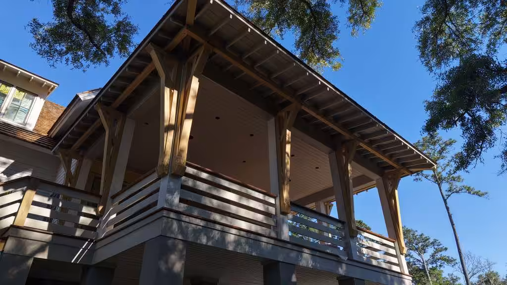 Covered porch with wooden beams.